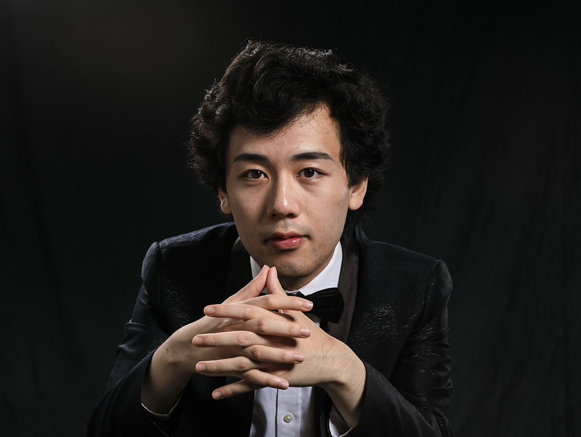 Asian-Scottish male pianist Yuanfan Yang